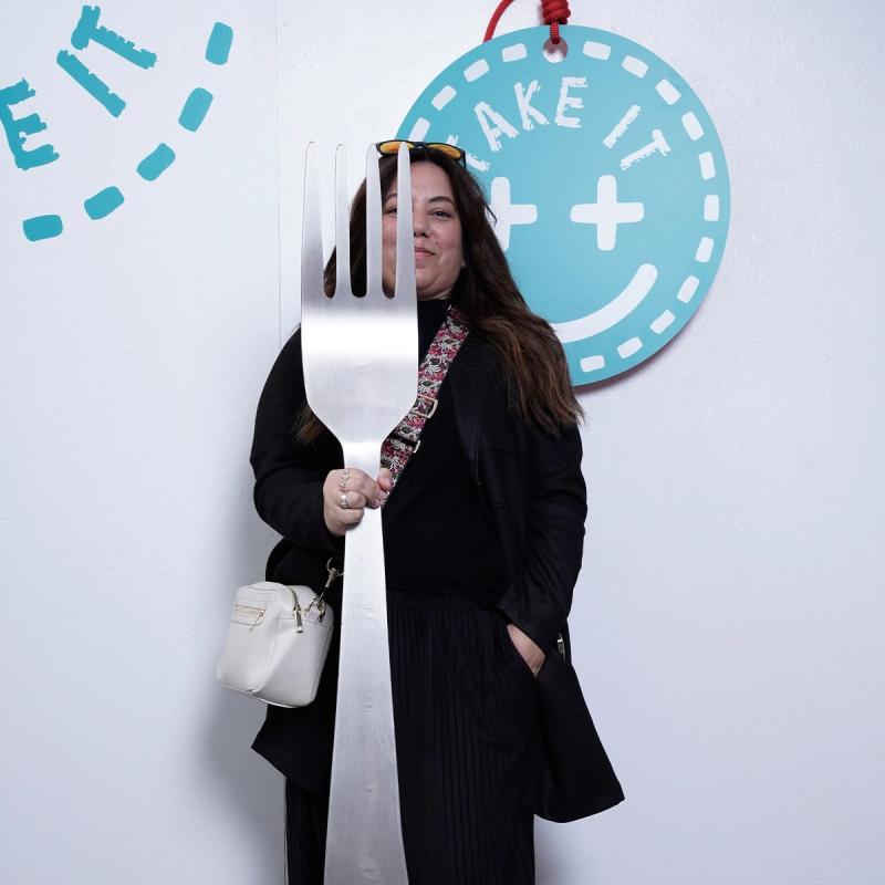 Designer Shirley Lauber with the four-foot-tall metal fork she won at “Take It or Leave It.” (Photo: Mattia Gargioni)
