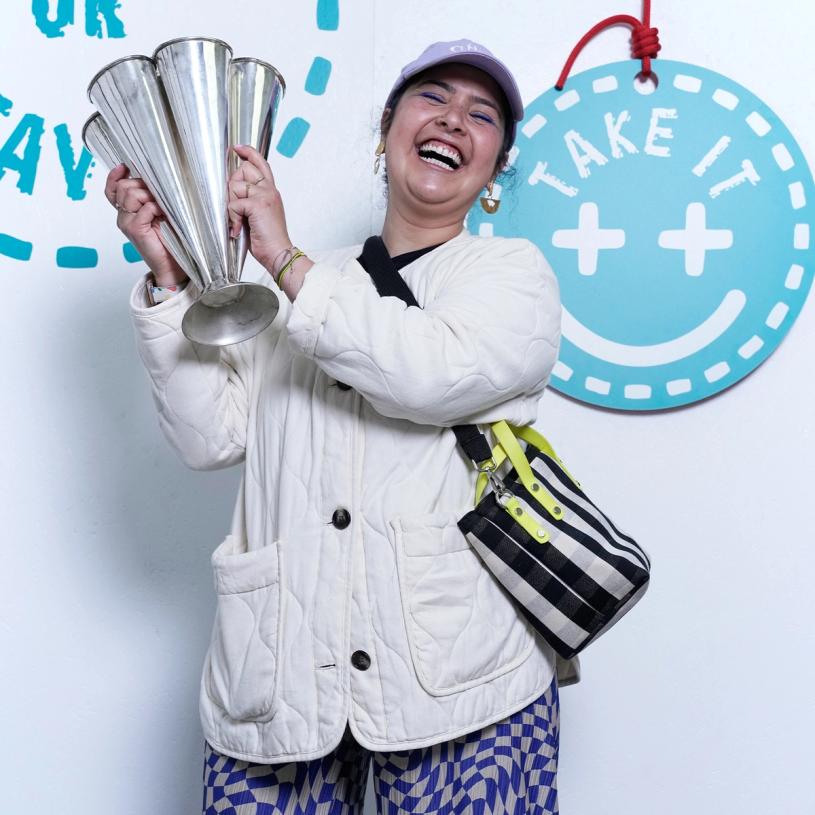 Designer Melanie Abrantes with the metal vase she won at “Take It or Leave It.” (Photo: Mattia Gargioni)