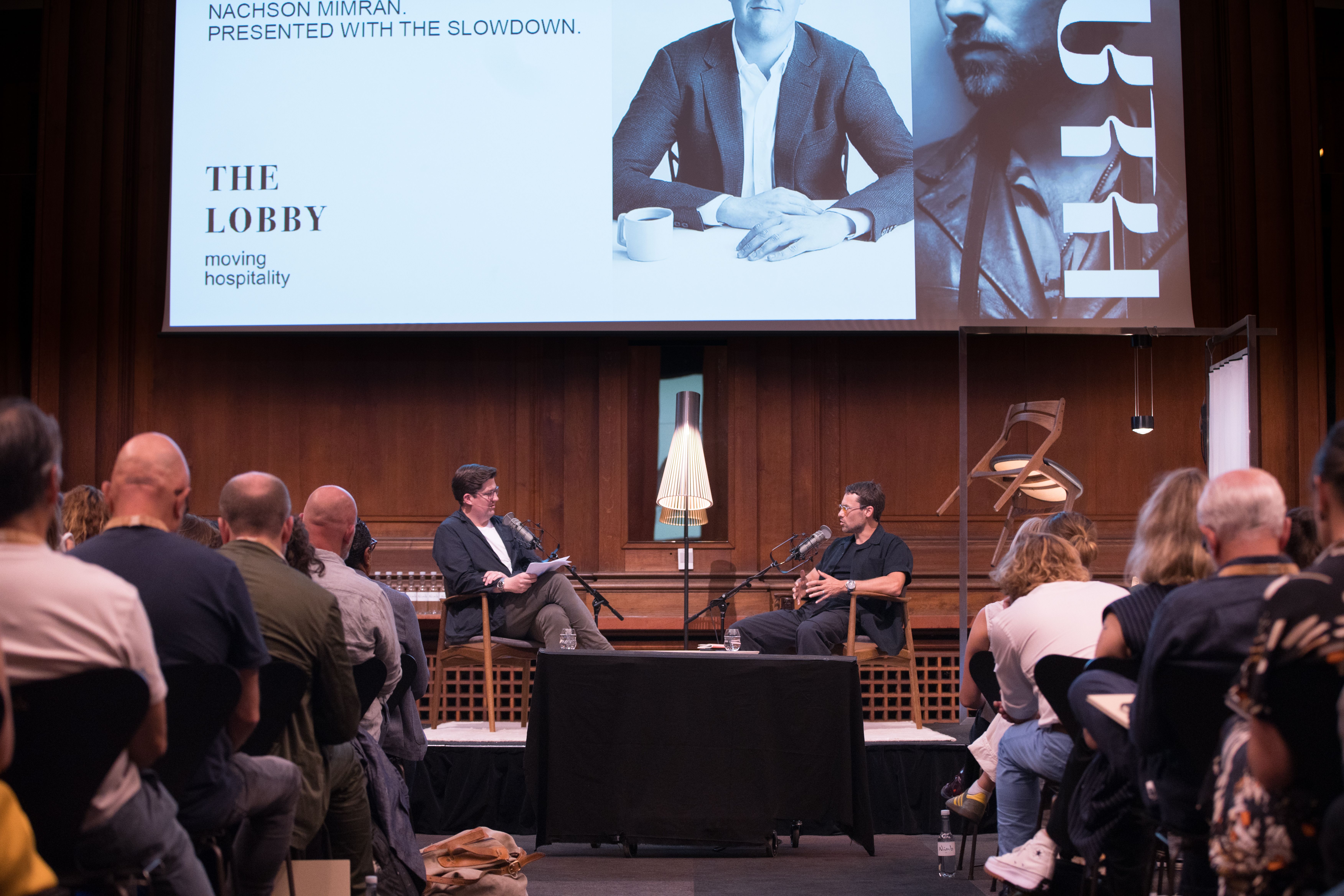 September 2024 | Nachson Mimran (right) and The Slowdown’s editor-in-chief, Spencer Bailey, record Ep. 122 of the Time Sensitive podcast in front of a live audience at The Lobby “hospitality event” in Copenhagen. (Photo: Nedergaard Film)