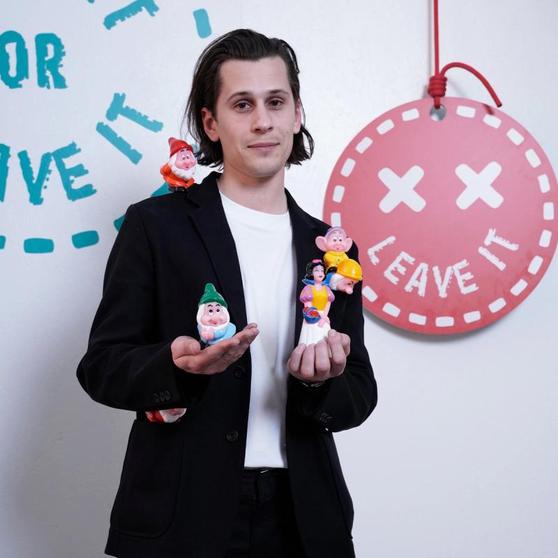 Product designer Mikolaj Nalewajko with figurines of Snow White and five of the seven dwarves, which he decided to leave behind at “Take It or Leave It.” (Photo: Mattia Gargioni)