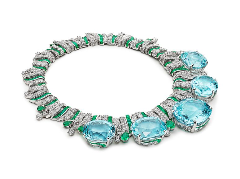 A diamond necklace with large turquoise gems
