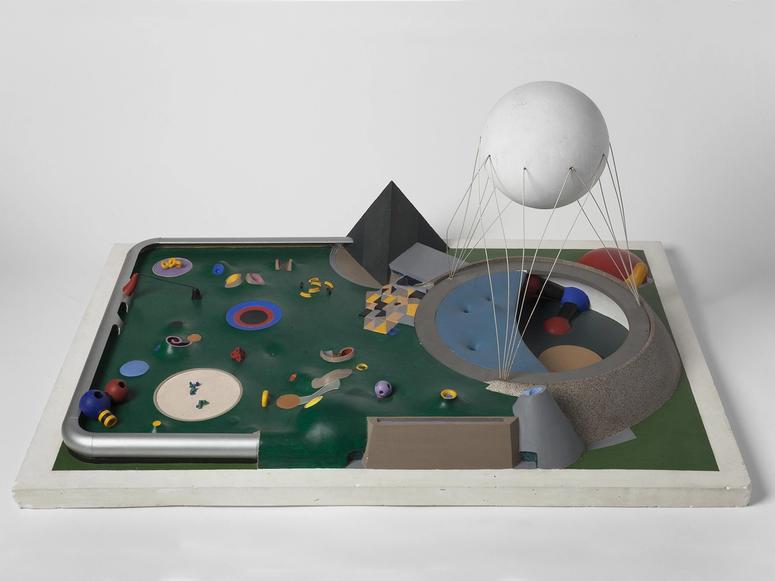 A Noguchi sculpture reminiscent of a green landscape.