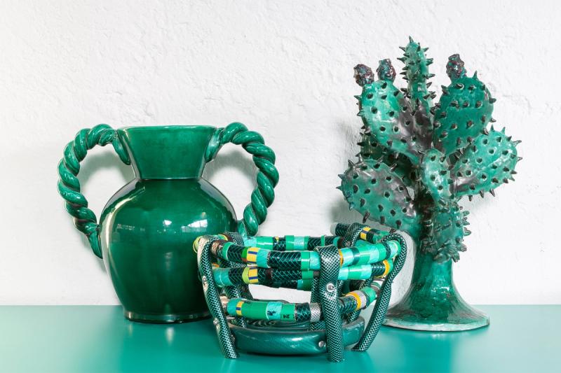 From left: A 1950s vase from the south of France, a bowl made out of industrial hoses, and a ceramic cactus from Naples. (Photo: Antonio Campanella)