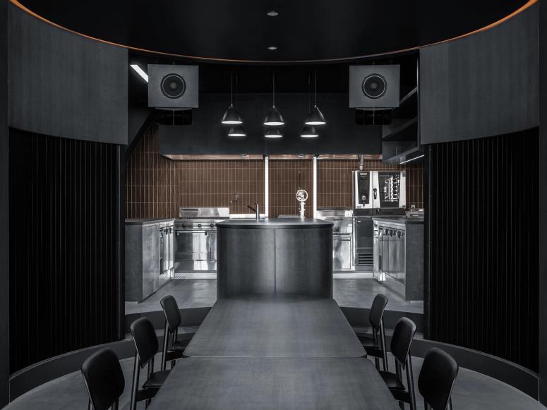 The dark interior of Burnside Tokyo, facing the kitchen.