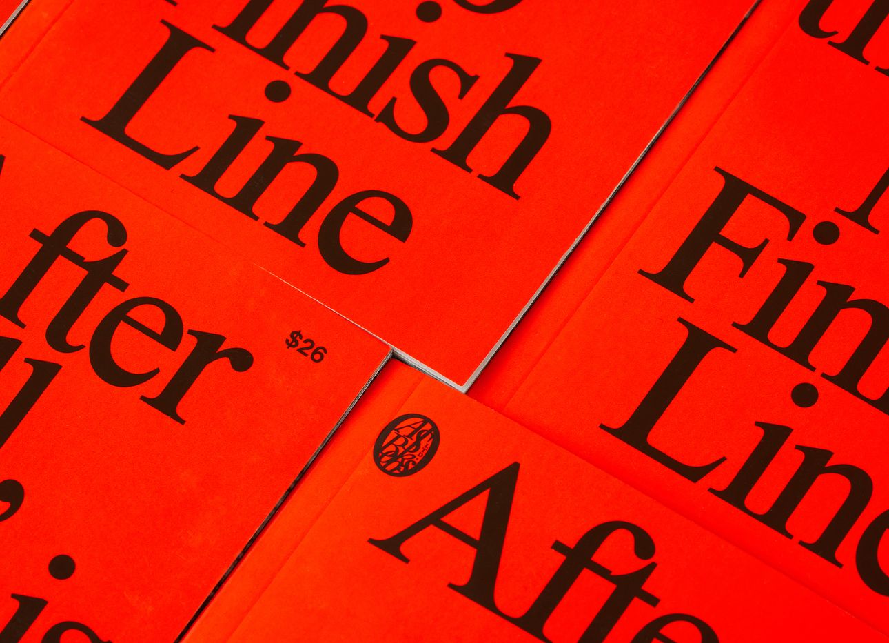 Overlapping copies of “No Finish Line.” (Photo: Weston Colton. Courtesy Nike)