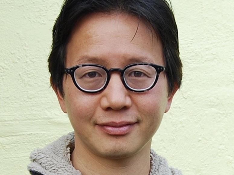 Author and professor Hsuan L. Hsu on a yellow background.