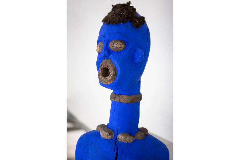 A sculpture from Africa, collected by Navone in the early 1970s, that she painted in her favorite cobalt blue. (Photo: Antonio Campanella)