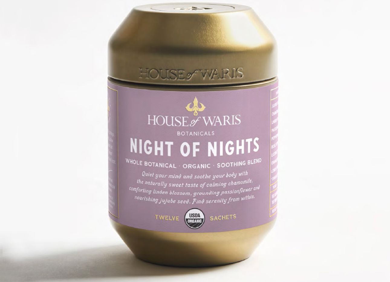 A purple and gold canister of House of Waris Night of Nights tea.