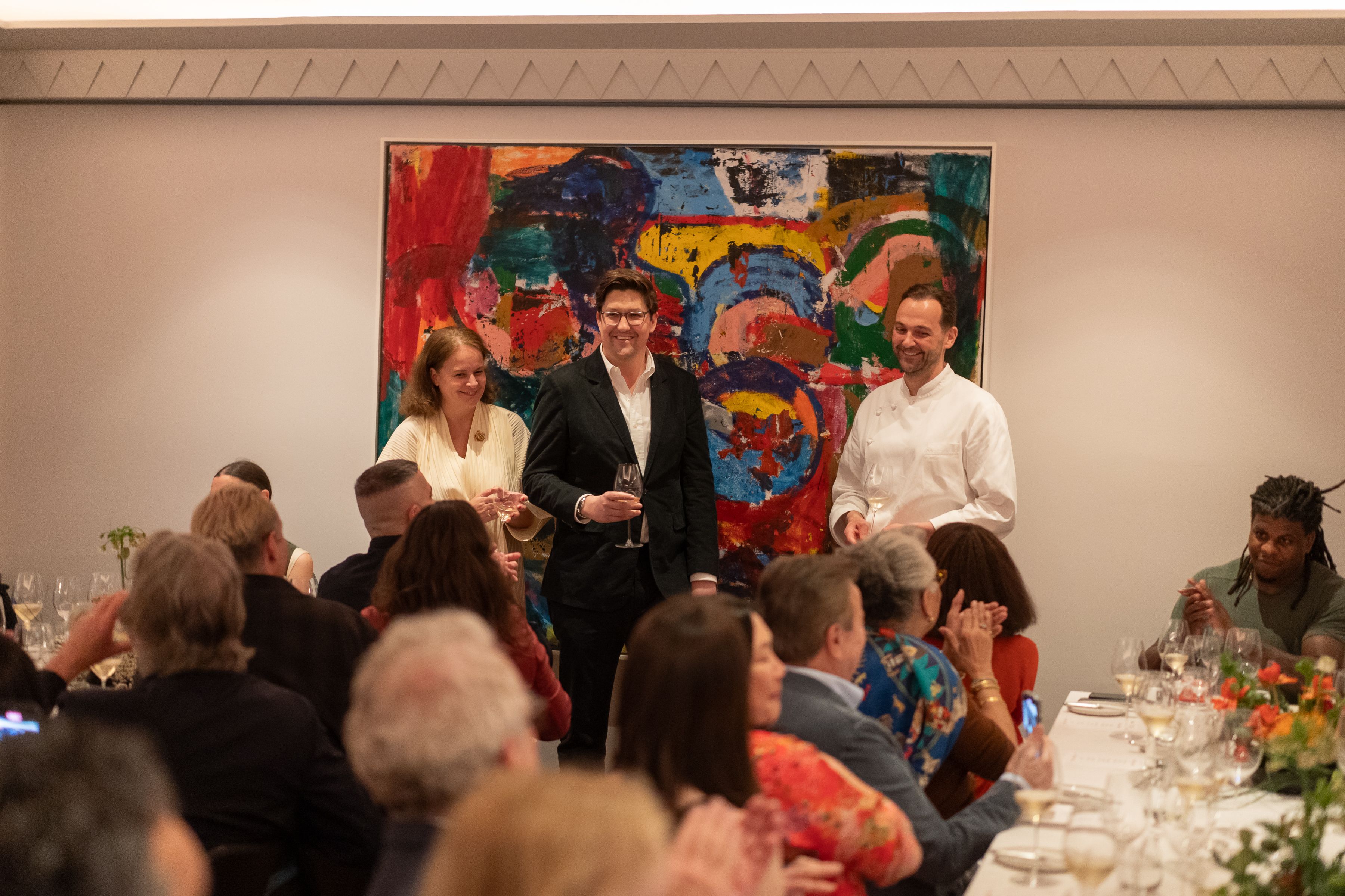 April 2024 | Left to right: Lise Macdonald, president of L’École, School of Jewelry Arts; The Slowdown’s editor-in-chief, Spencer Bailey; and chef Daniel Humm giving a toast at The Slowdown’s five-year anniversary dinner at Eleven Madison Park, hosted in partnership with L’École and with champagne from Ruinart. (Photo: Angela Pham)