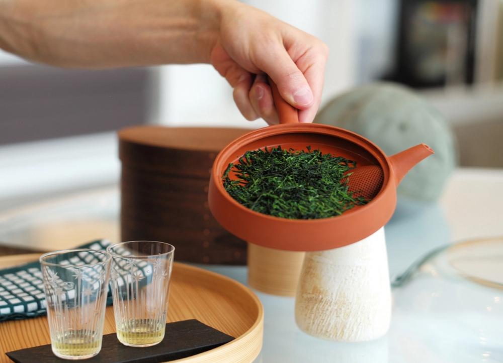 Gyokuro tea in a small red teapot.