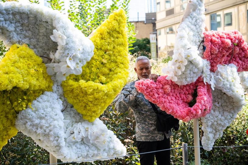 Mr. Flower Fantastic creating his interactive floral sculptures for the fair. (Courtesy Emerson Collective)