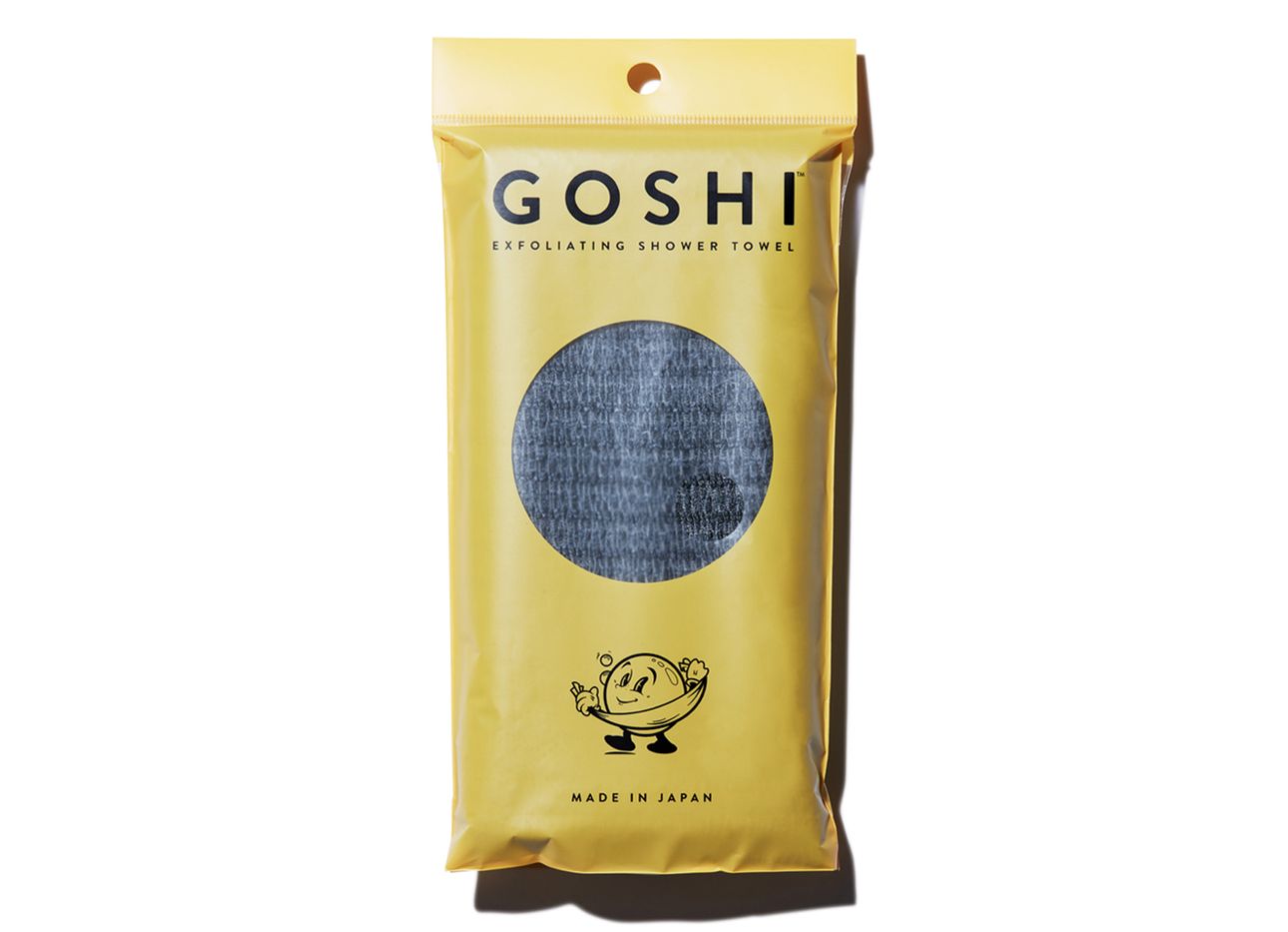 A Goshi towel in a yellow package.