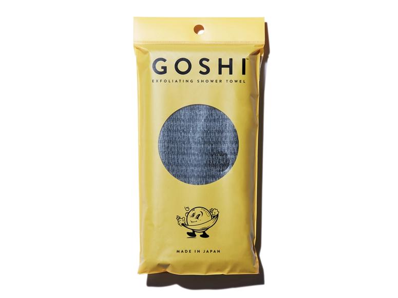 A Goshi towel in a yellow package.