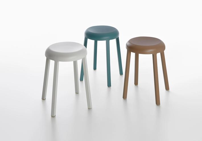 Three stools in white, blue, and brown.