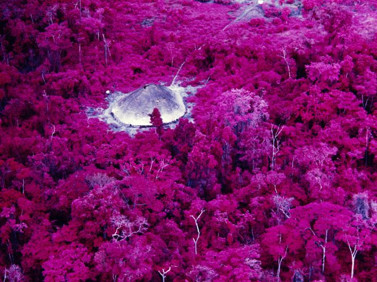 A collective house near the Catholic mission on the Catrimani River in the Roraima state of Brazil, photographed by Claudia Andujar in 1976. (Courtesy the artist)