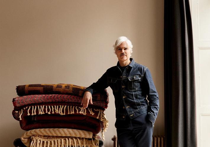 Tom Delevan with his new Archival rug collection for Beni Rugs. (Courtesy Beni Rugs)