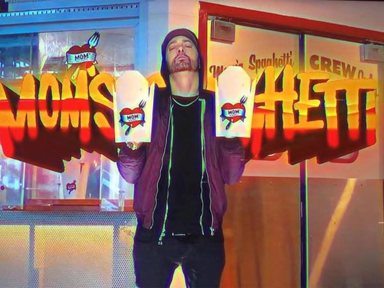 Eminem in front of his restaurant, Mom’s Spaghetti