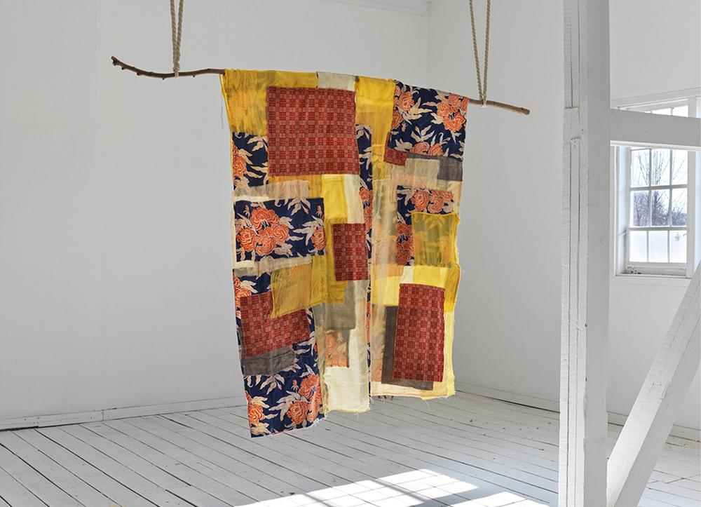 A patchwork tapestry by Megumi Shauna Arai.