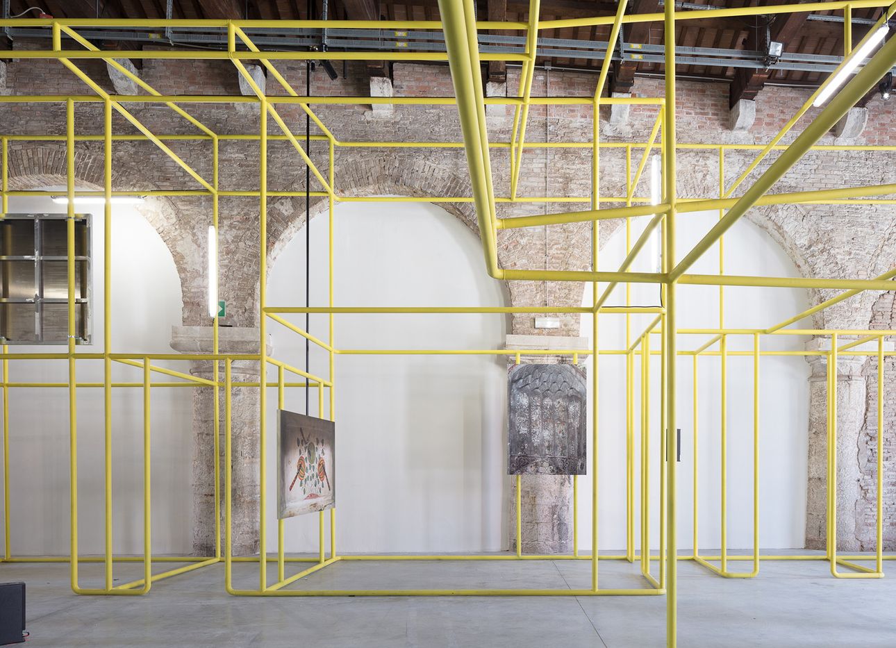Interior of an industrial space with yellow scaffolding