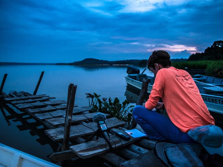 Filmmaker Grace Boyle tracking sensory data in the Amazon. (Photo: Fábio Nascimento. Courtesy Greenpeace)