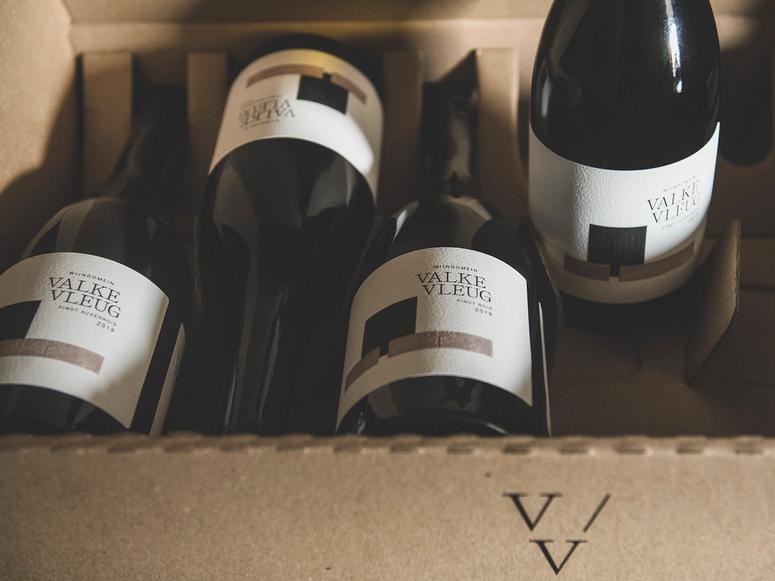 Four Valke Vleug wine bottles in a carton.