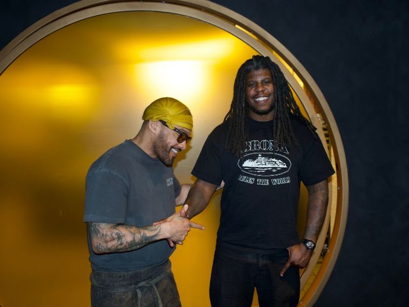 Jon Gray (right) and Lester Walker, two of the three co-founders of Ghetto Gastro, inside the culinary collective’s new New York City restaurant, Gourmega. (Photo: Elissa Salas/Courtesy Ghetto Gastro)