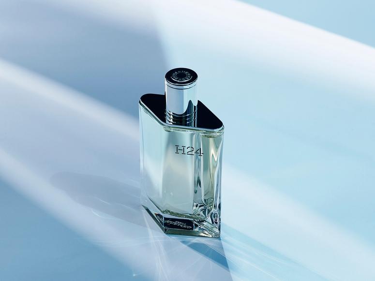 A bottle of Hermés's H24 in futuristic lighting.