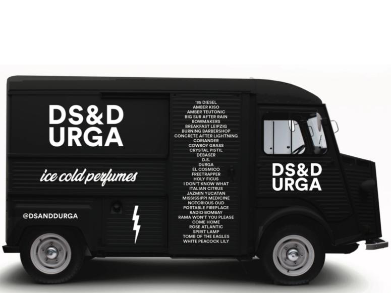 The black D.S. & Durga perfume truck.