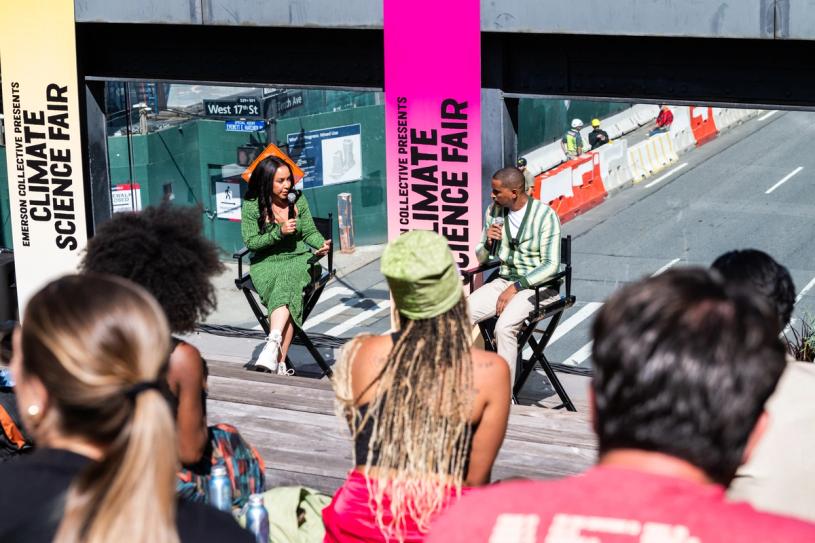 Julia Collins, founder and CEO of Planet FWD, in conversation with the chef JJ Johnson at the fair. (Courtesy Emerson Collective) 