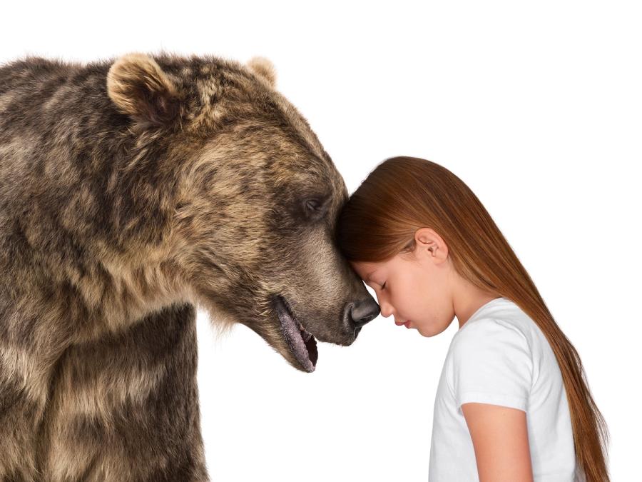 Photo of child with bear from The Lion's Share campaign