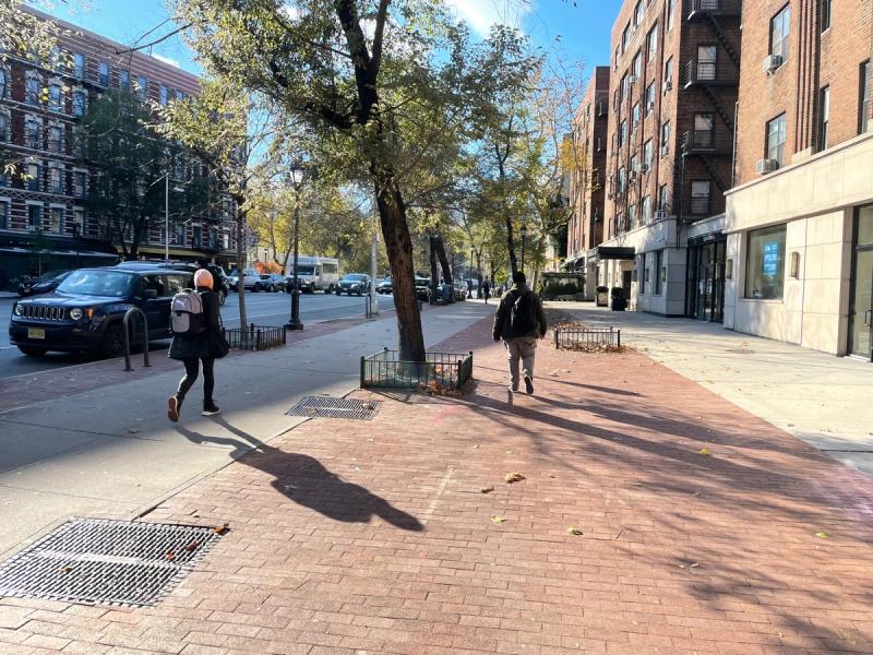 The widened sidewalk along Sixth Avenue near 10 Downing Street. (Photo: Spencer Bailey)