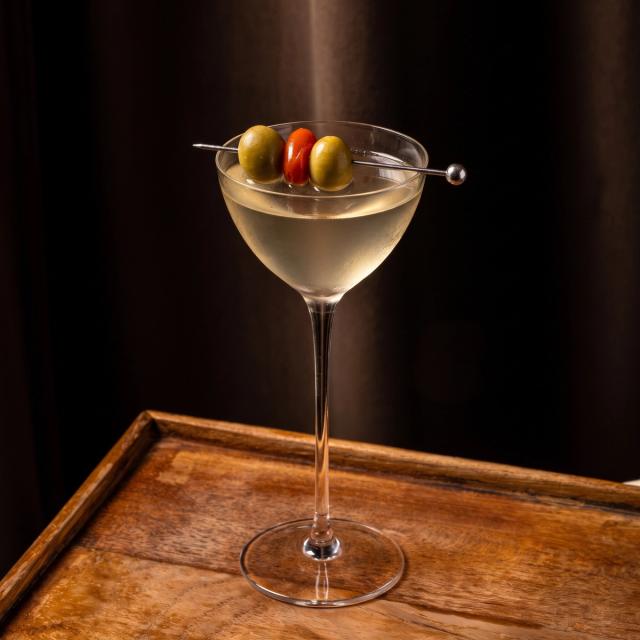 The Clarified Bloody Mary, a chef edition cocktail of mezcal and tomato water, as shown on the Bisou Bangkok drinks menu