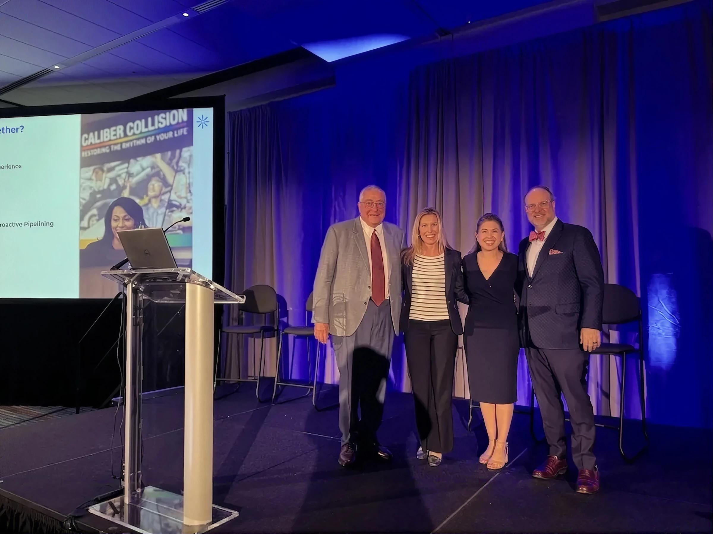 Four presenters together after a Caliber Collision talent event