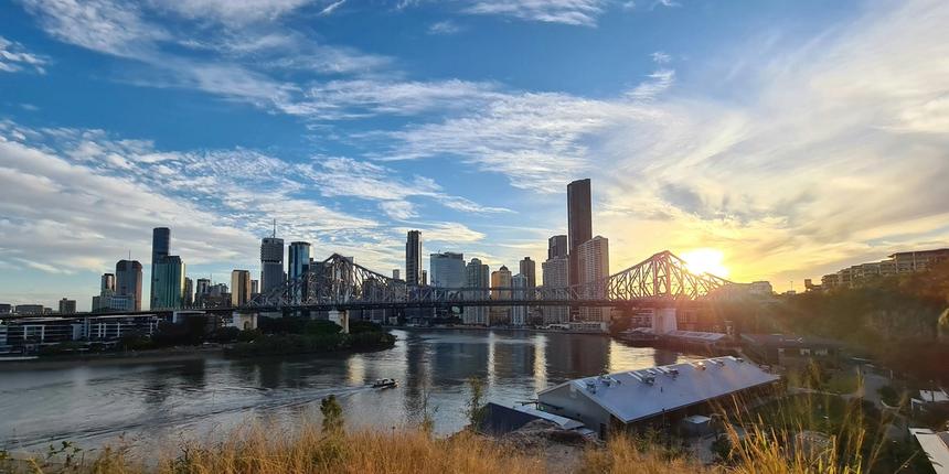 Brisbane skyline and Story Bridge at dusk, August 2026