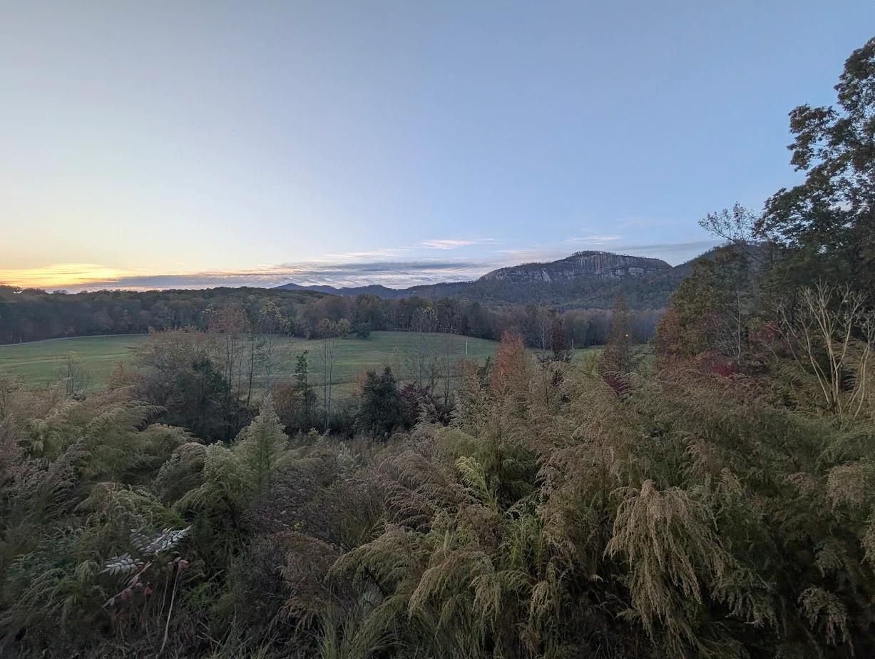 Evening view across the meadow and mountains from Grant Meadow Overlook in Upstate South Carolina