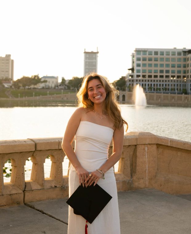graduation shoot in front of lake