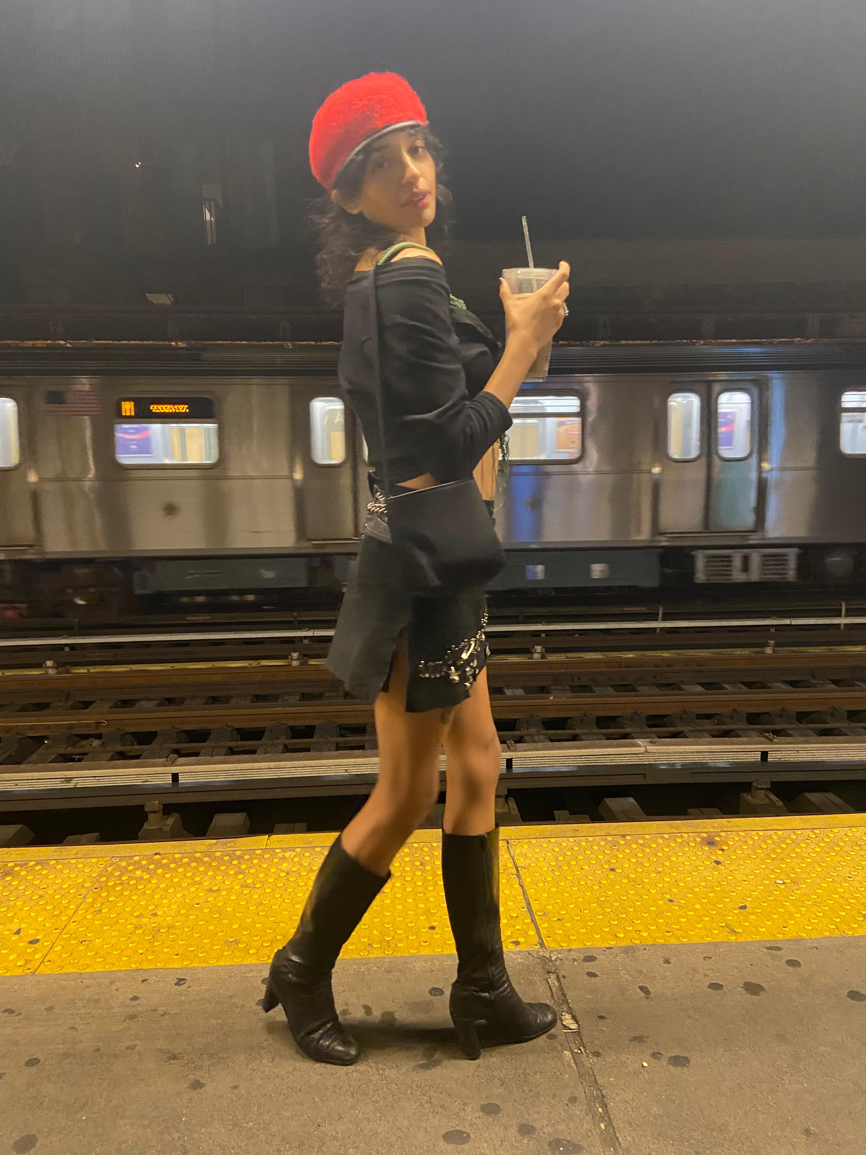 Model Destiny Strudwick poses with her Hai Silk Little Cross Body Bag in Black