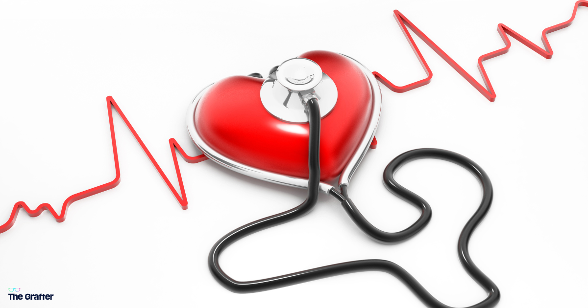 A stethoscope listening to a heart with a heart rate line across the page.