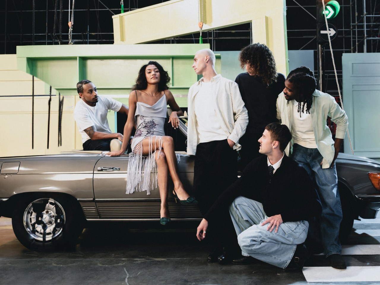 olivia dean sat on classic car