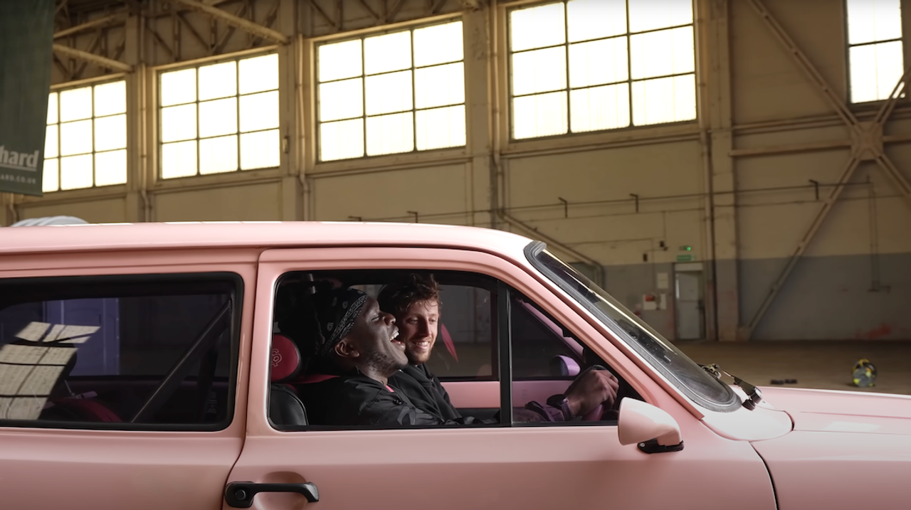 Sidemen team in pink classic car
