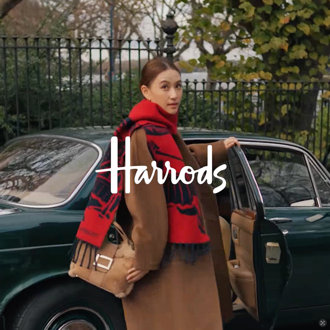 lady stood in front of classic car