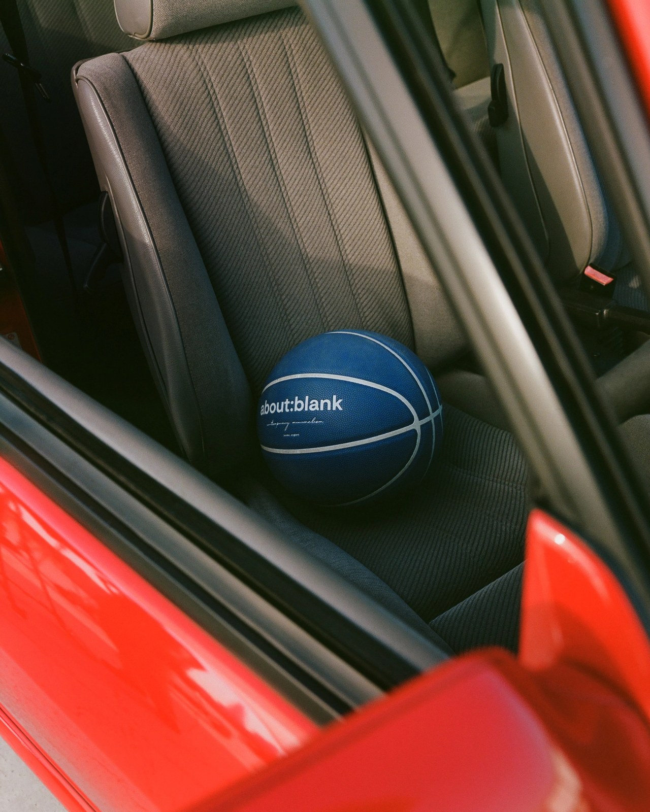 basketball on classic car seat