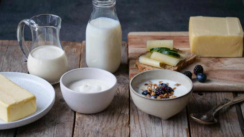 there are many different types of dairy products on the table .