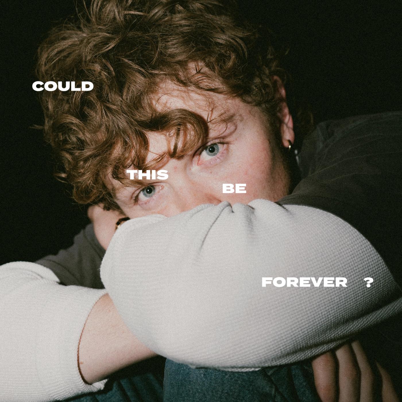 Will Linley hides the lower half of his face in a white sleeve beside the words COULD THIS BE FOREVER ?