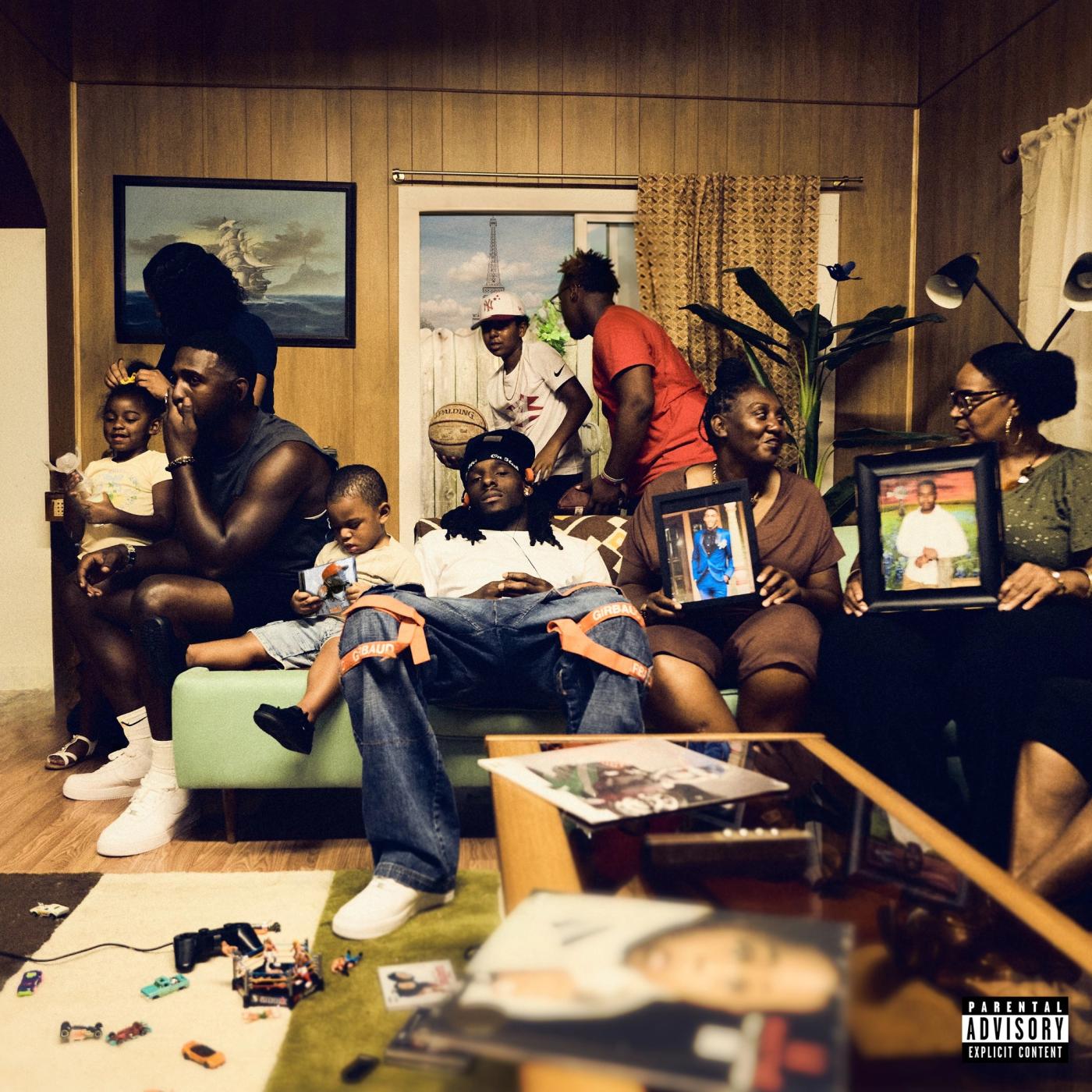 My Forte cover: a family gathers in a wood-paneled living room around a seated man, two women holding framed portraits, toys and magazines on the rug