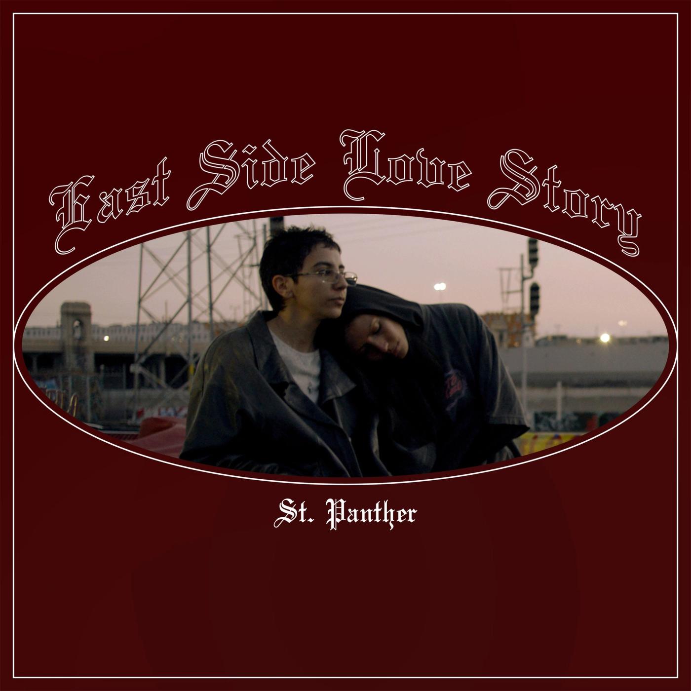 East Side Love Story cover: two people lean together in an oval photo against an industrial skyline at dusk, on dark red with ornate title lettering