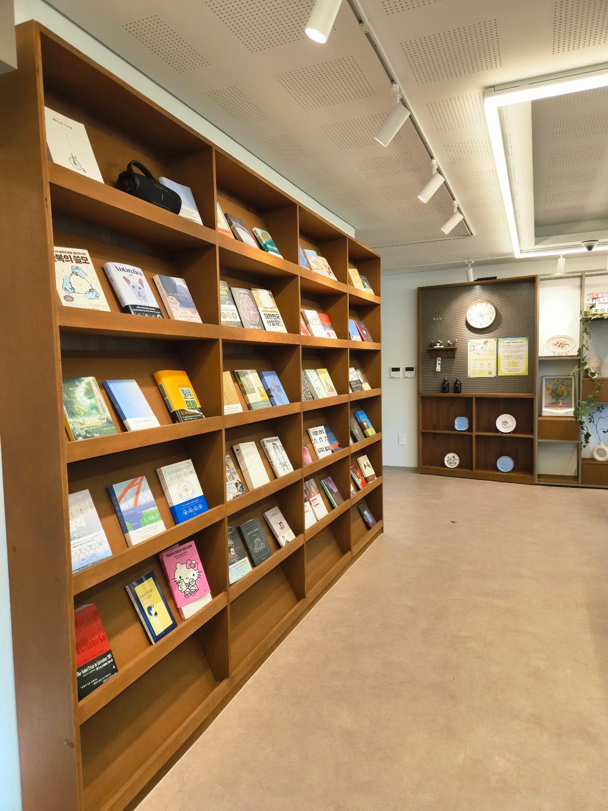 Cozy interior with a large wooden bookshelf