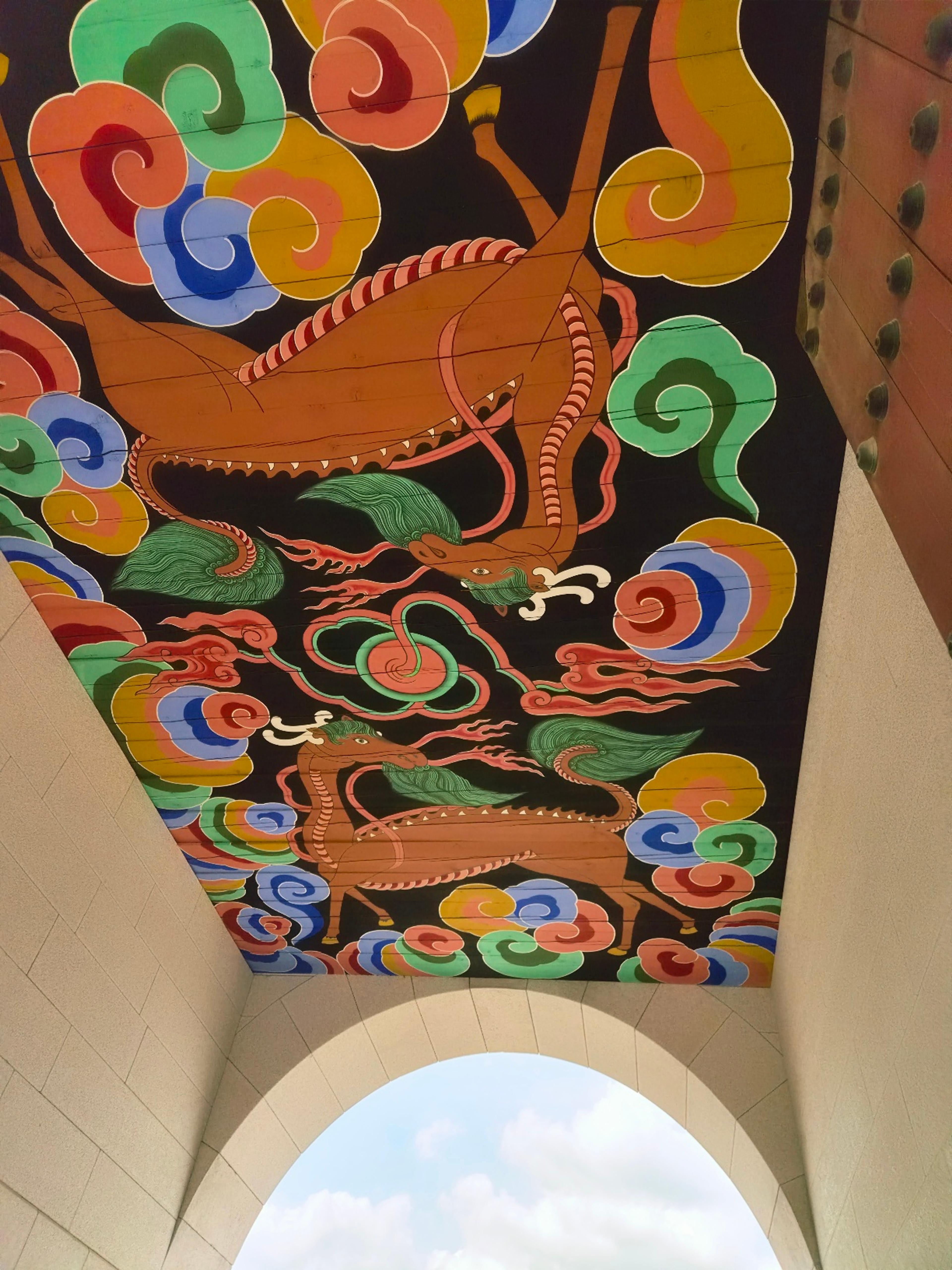 the Gwanghwamun Gate entrance — the wide shot with the dragon mural ceiling