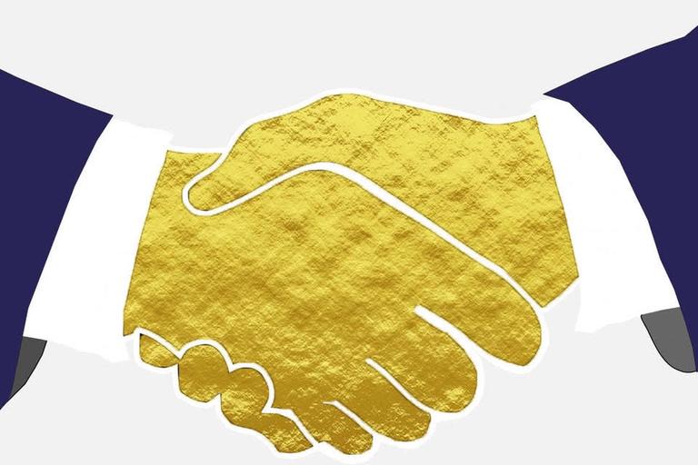 Gouden handdruk via de rechter