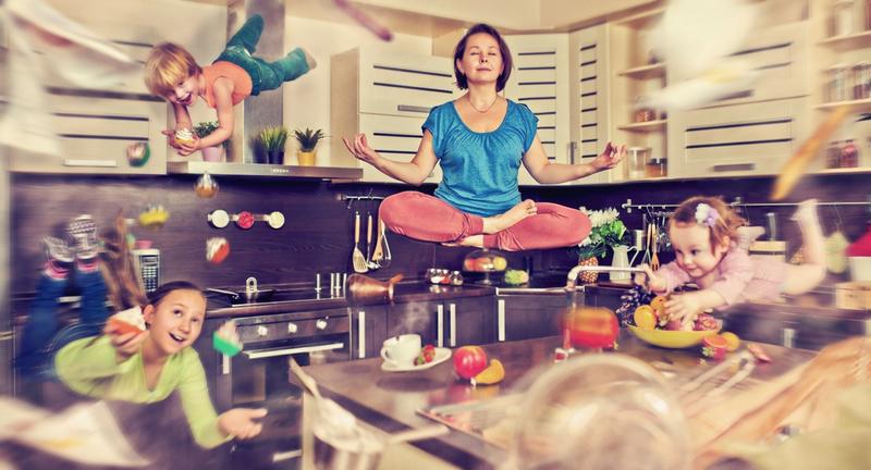 Woman in a yoga pose surrounded by chaos